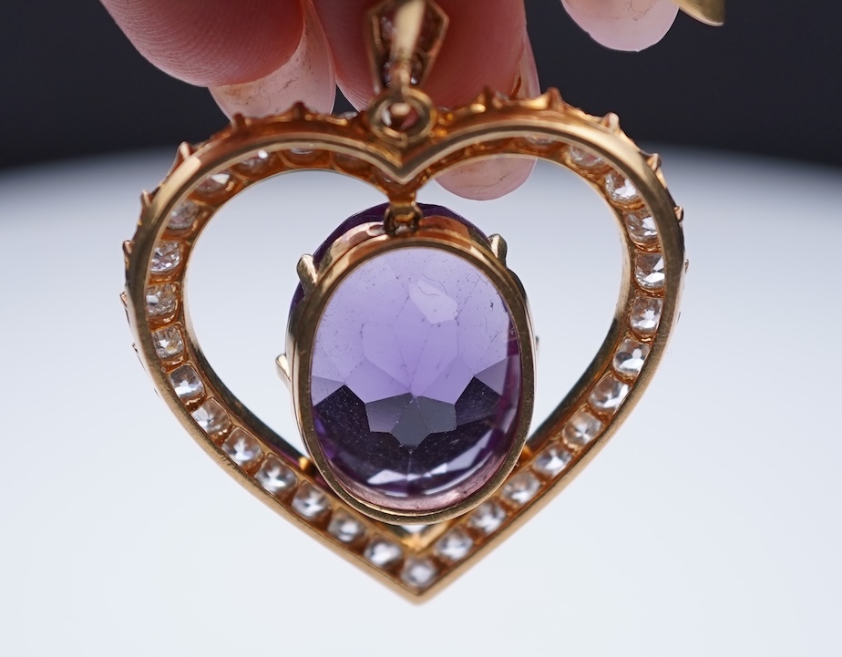 A synthetic sapphire and diamond pendant, mid 20th century